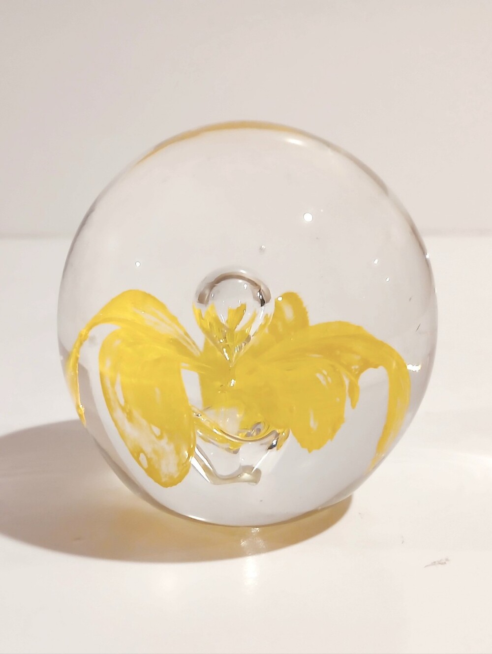 Handblown Glass Art Paperweight with Yellow Flower Accent